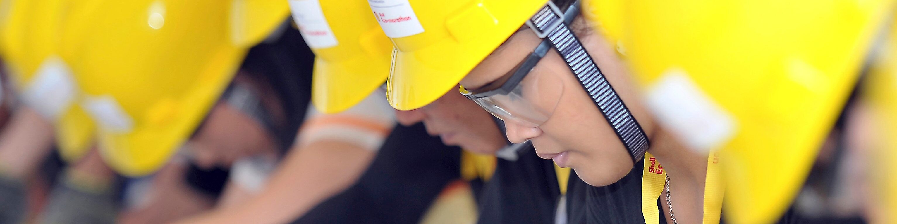 Shell employees working on FCC Internals equipment