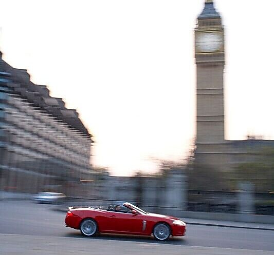 Car on the street in front of Big Ben