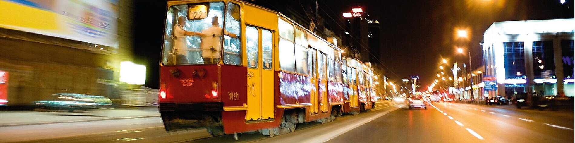 Tram on the street in Warsaw at night