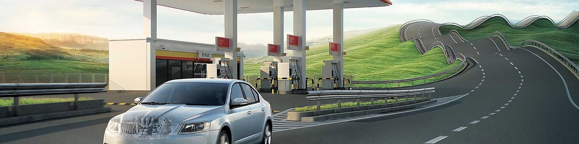 Car passing by Shell retail station